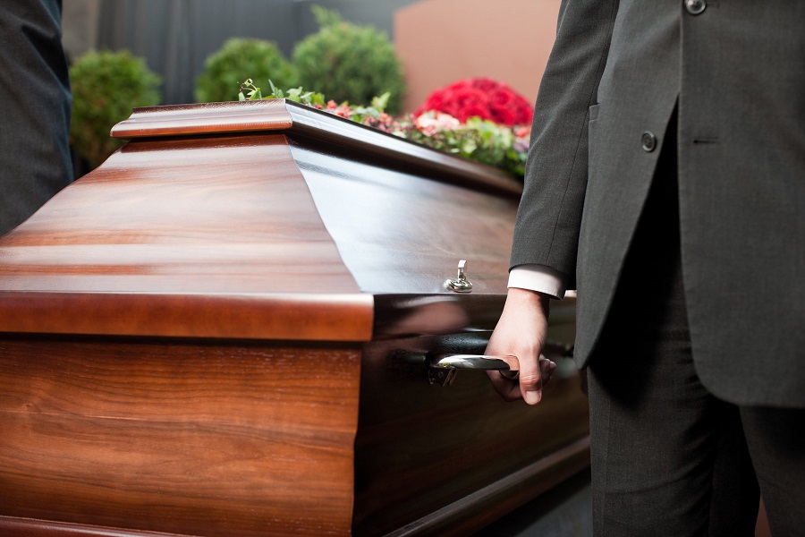 Dead woman found breathing, in coffin at own funeral