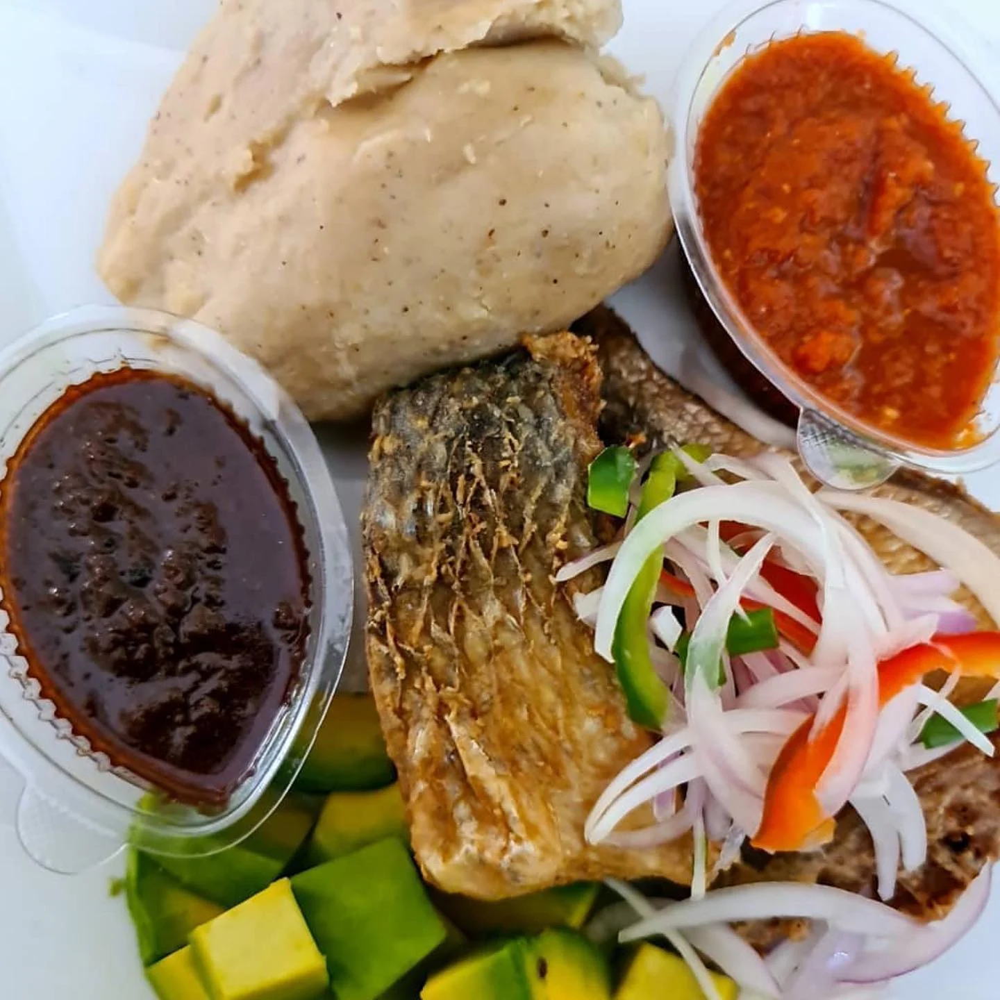 Kenkey with Fried Fish and Pepper Sauce