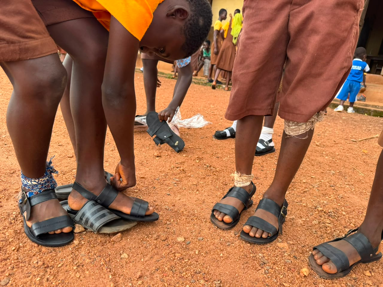 Hope Renewal Center Donates 200 Pairs of Sandals to Pupils of Asibirim DA Basic School